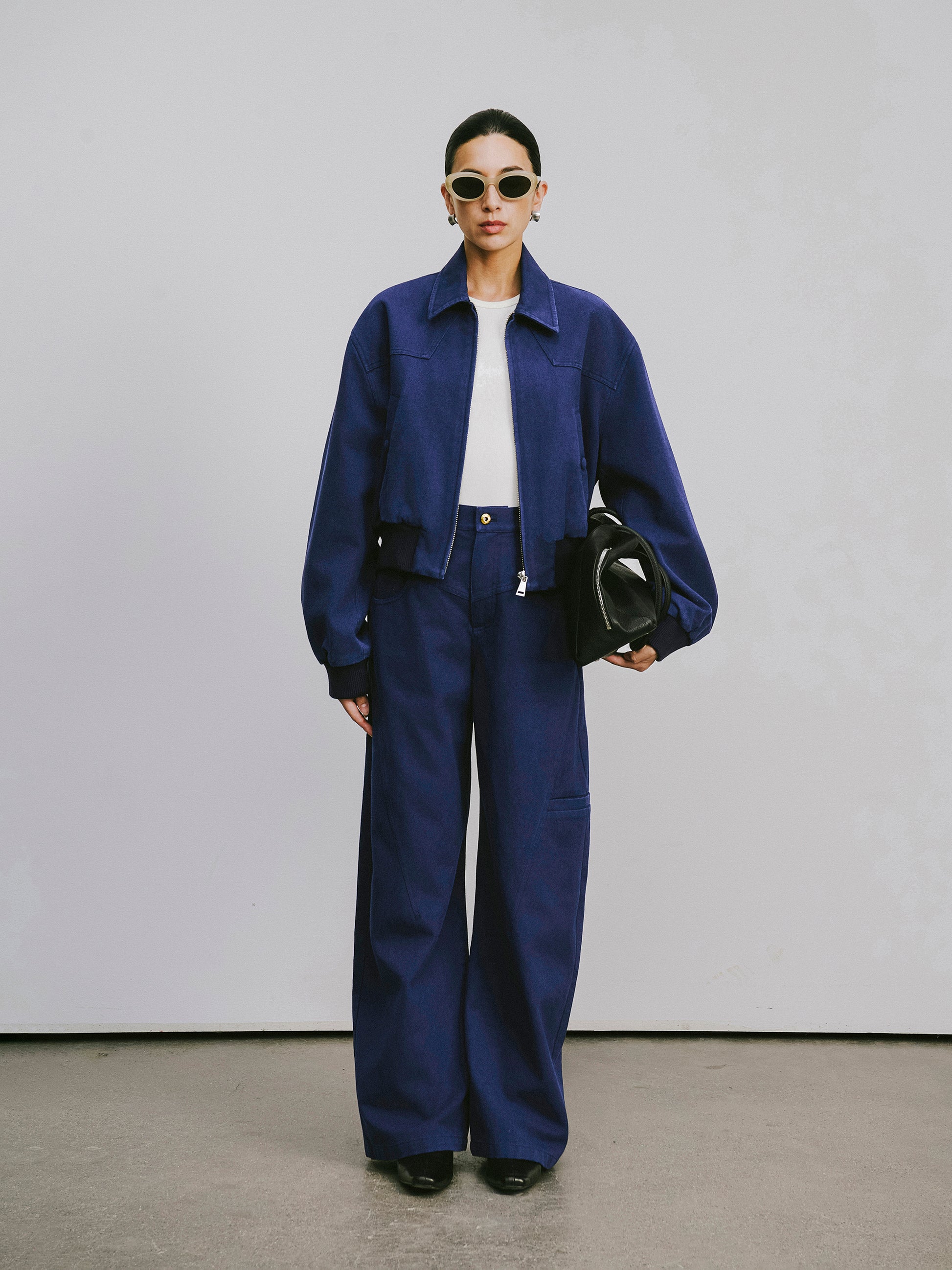 High-Rise Curved Hem Denim Pants